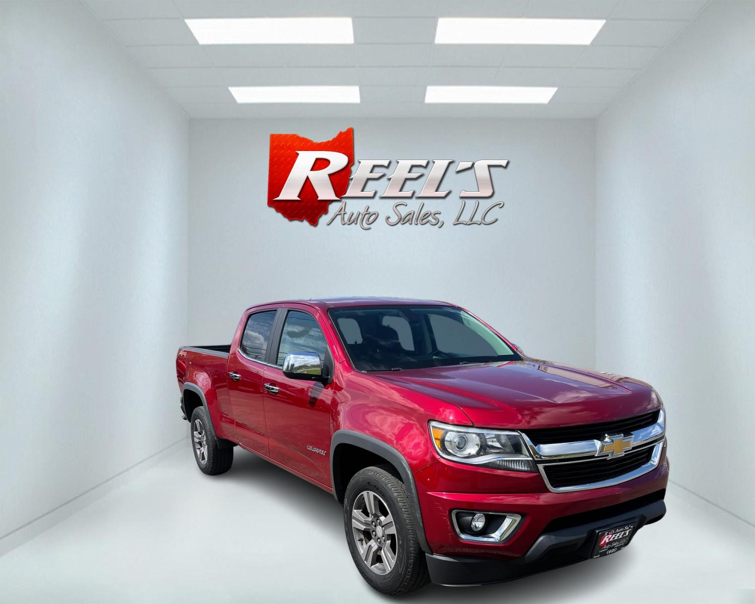 2018 Red /Black Chevrolet Colorado LT Crew Cab 4WD Long Box (1GCGTCENXJ1) with an 3.6L V6 DOHC 24V GAS engine, 8-Speed Automatic transmission, located at 547 E. Main St., Orwell, OH, 44076, (440) 437-5893, 41.535435, -80.847855 - Photo #2